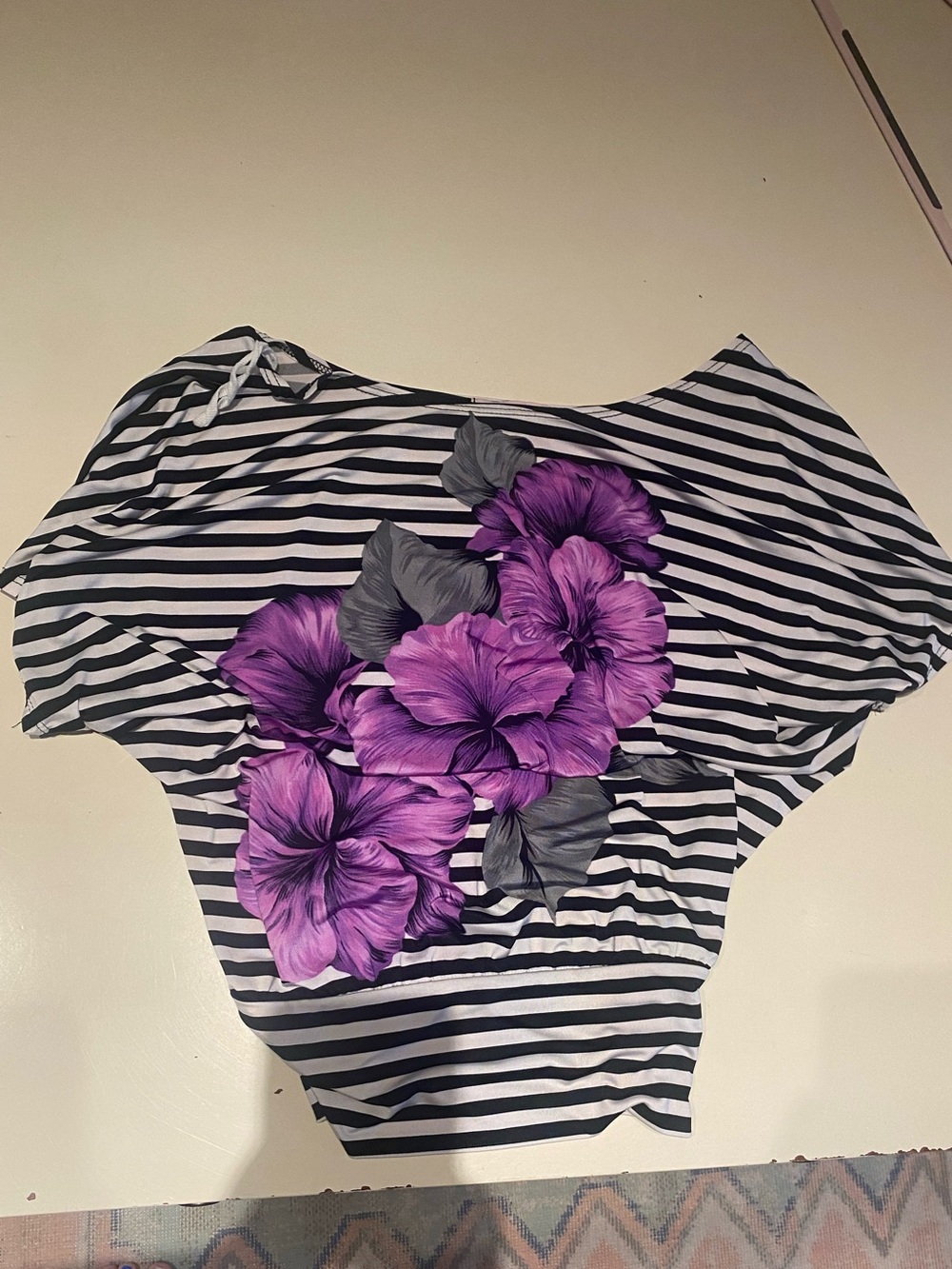 Striped Black & White Boatneck Top with Purple Floral Accent